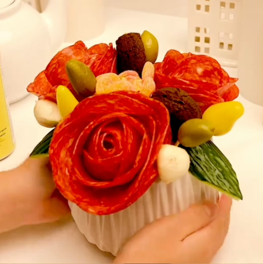 A bouquet made the ingredients of the recipe with 2 edibles at the center