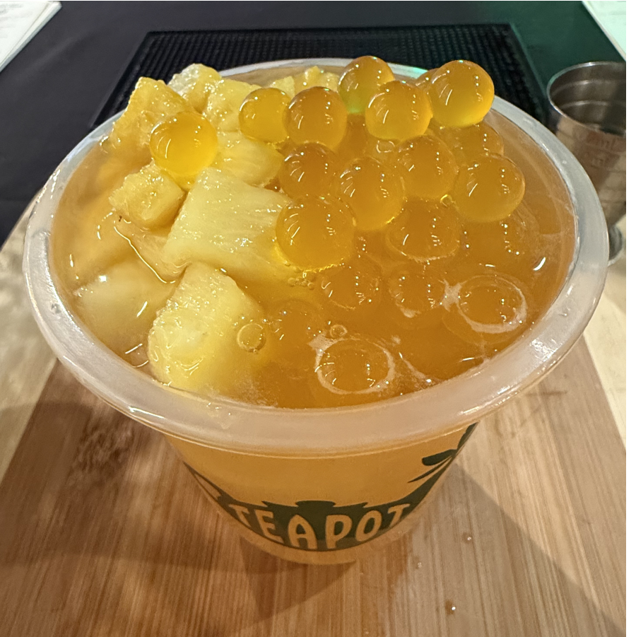 Pineapple and Mango bobbing in a cup